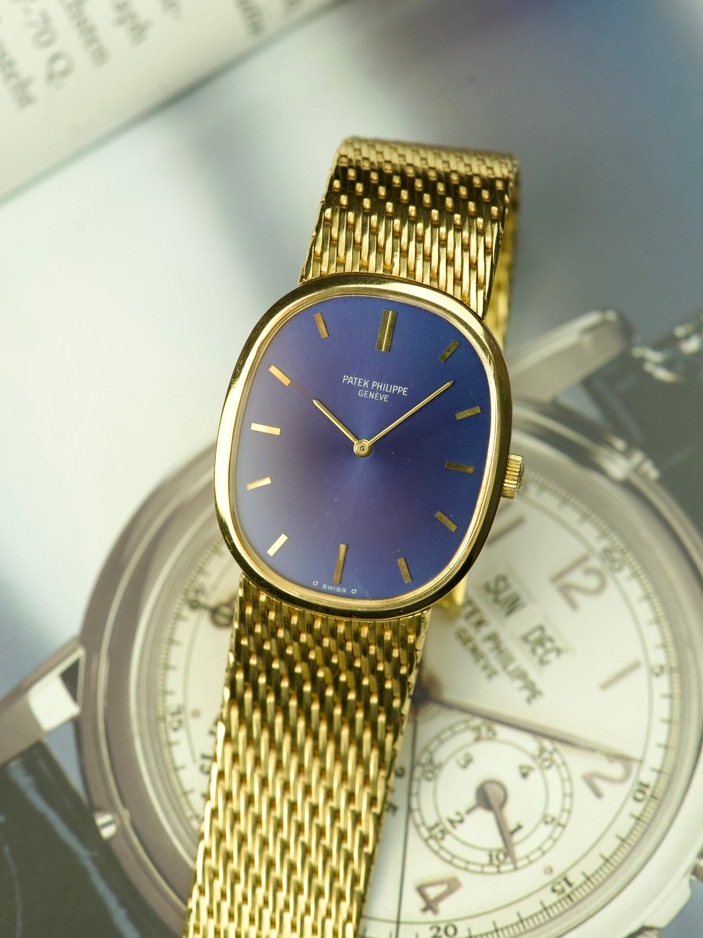 80s Patek Philippe Ellipse 3748 Blue Sunburst 18 Carat Yellow Gold